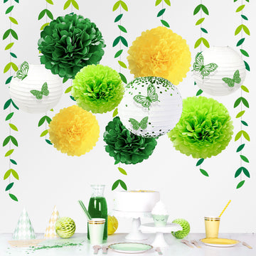 Green and yellow paper lanterns with butterfly and leaf decorations for garden party backdrop