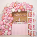 gender reveal or baby girl party decor with pastel balloon setup