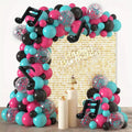 
music themed birthday balloon arch with pink, black and turquoise latex balloons