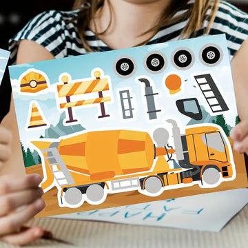 Child holding a construction-themed sticker sheet with cement mixer truck