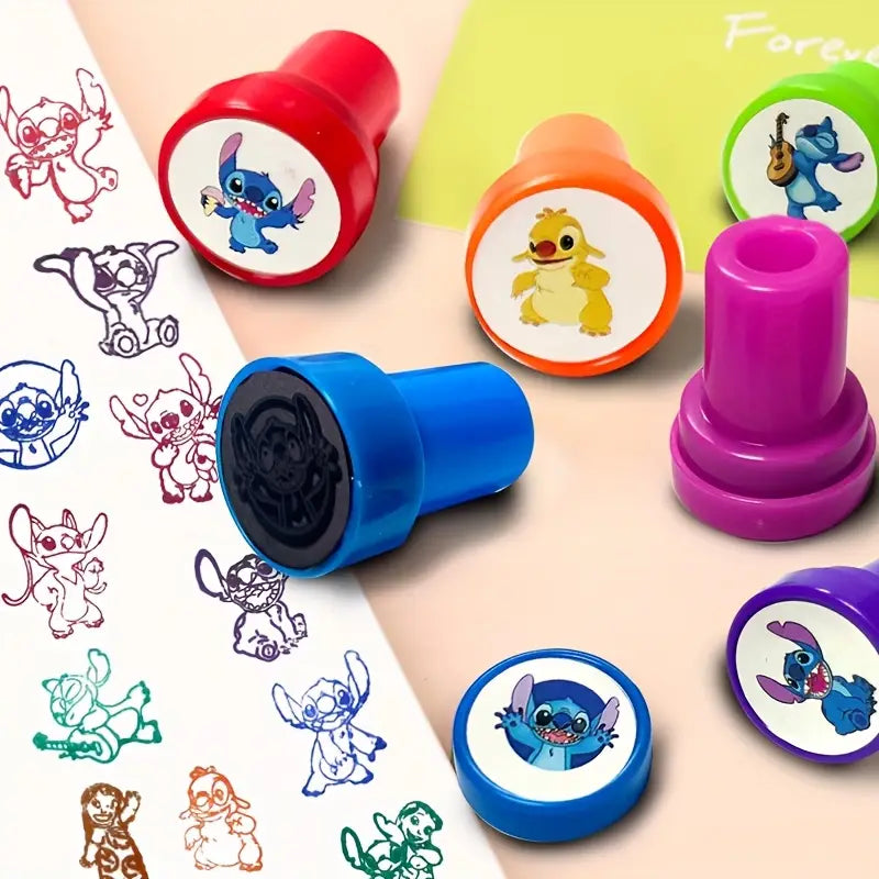 Self-inking cartoon stamps set showing colorful impressions and easy-to-hold stampers.