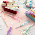 Party blowouts displayed in gift boxes for celebrations